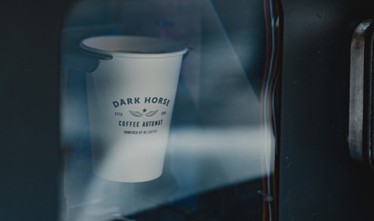 Coffee is passing by the RC Coffee window.