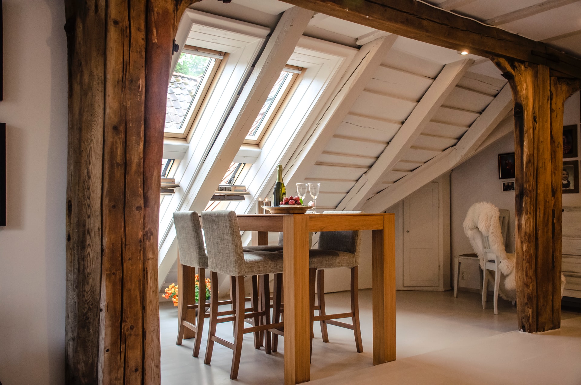 dining room with wooden beams