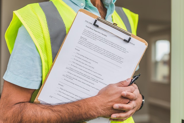 a man holding a clipboard