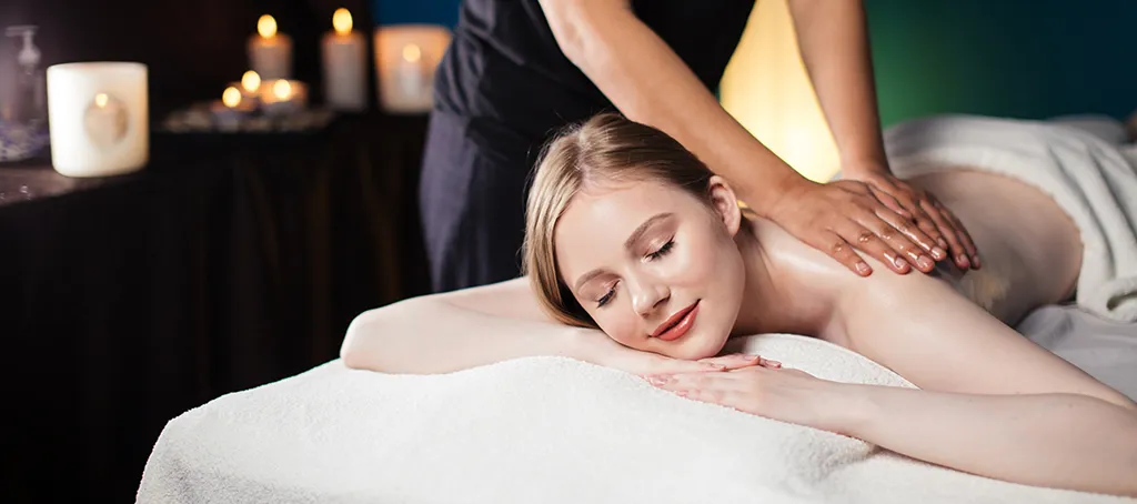 Sports massage FAQ page for Elite Healers in Midtown Manhattan NYC answering questions about deep tissue, medical, and recovery massage